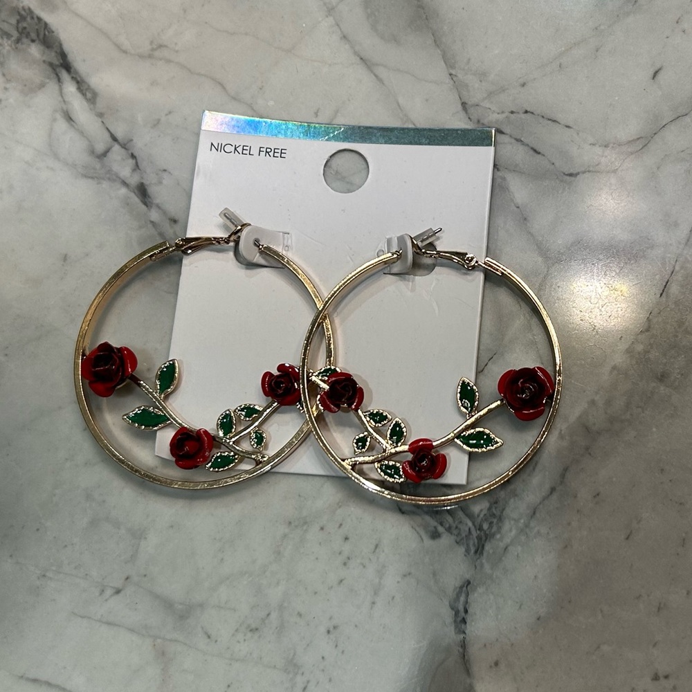 Woman’s rose hoop earrings